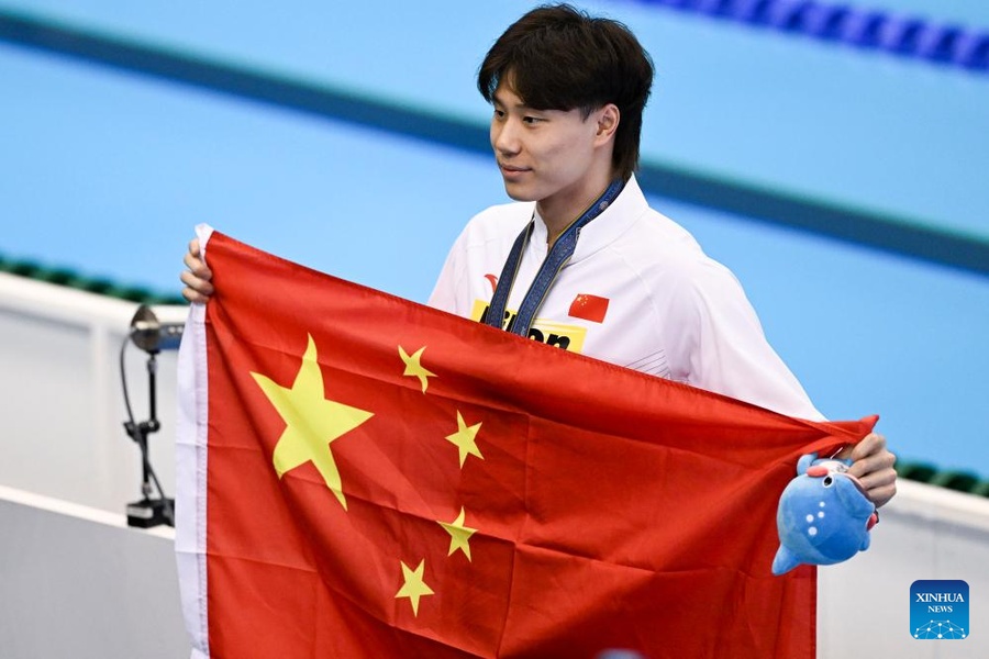 Qin Haiyang completed a 50-100-200m breaststroke treble on Friday.  ©  Xinhua/Xu Chang