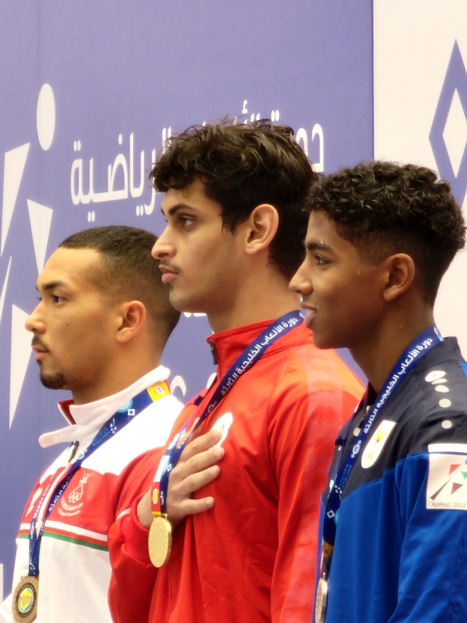 Saoud Al-Shamroukh (right) at the medal ceremony for the men's 200m freestyle at the GCC Games. © OCA