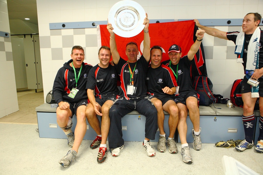 Dai Rees (ctr) lifts the HK7s Shield (2010). L to R- Rodney McIntosh, Justin Faulkner, Alex Gibbs, Nathan Stewart, Tim Alexander