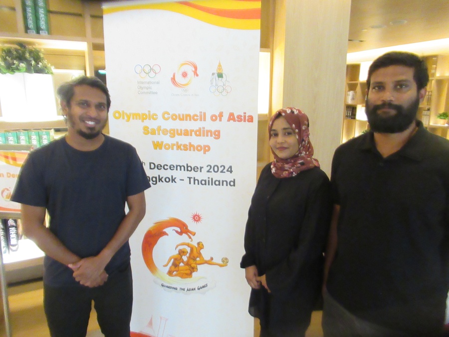 Thamooh (left) is pictured with Maldives Olympic Committee colleagues Mariyam Saufa and Ibrahim Shifaz at the Holiday Inn Bangkok on Wednesday.