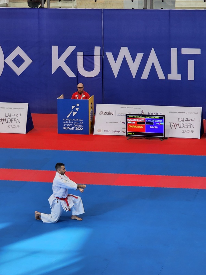 Gold medal winner in kata, Kuwaiti Mohammed Sayed Al-Mosawi with OCA assistant Secretary General Ali Al-Marri. © OCA