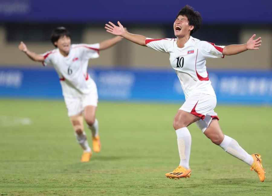 DPRK's Ri Hak celebrates a goal against the Republic of Korea (Photo: Xinhua)