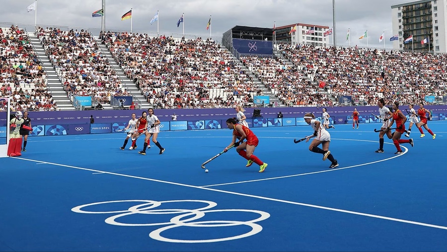 The International Hockey Federation (FIH) won the IOC Climate Action Award for International Federations in 2024 for their “dry turf” project. © Olympics.com