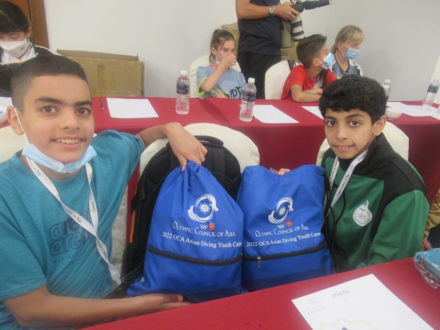 Two of the young divers are happy at the OCA camp. © OCA