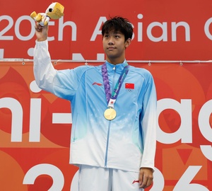 Zhang in seventh heaven after breaking Asian Games record
