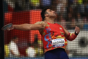 Iranian strongman Hadadi overcomes COVID-19, misses discus competition