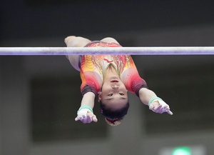 Chinese women gymnasts hold on to extend perfect record of golds in team event