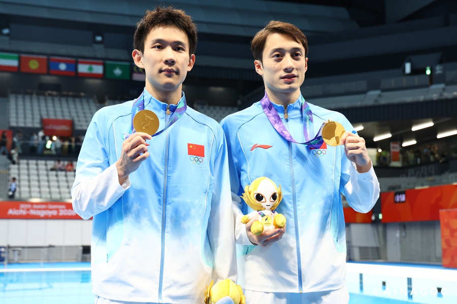 Yang, Lian erase Tokyo disappointment with Asian Games gold