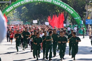 Fans and runners flock to Vietnam’s Olympic Day celebration